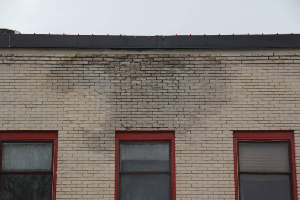 damaged spalled brick