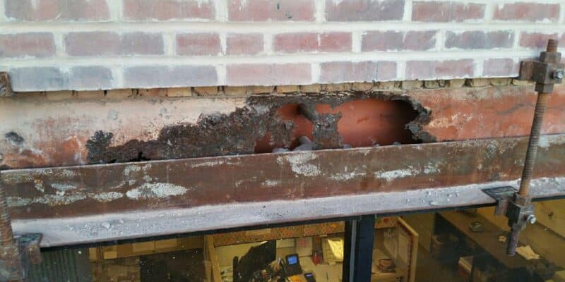 Masonry steel corrosion rusted structural steel with significant section loss.